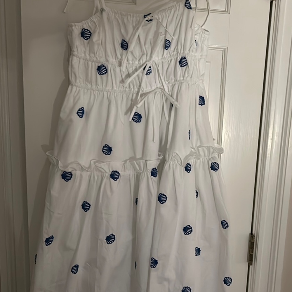 Elegant White Dress with Blue Shell Accents